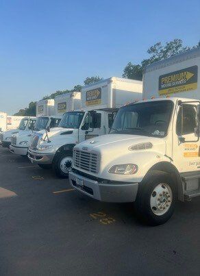 Fleet of 26' moving box truck ready to move.