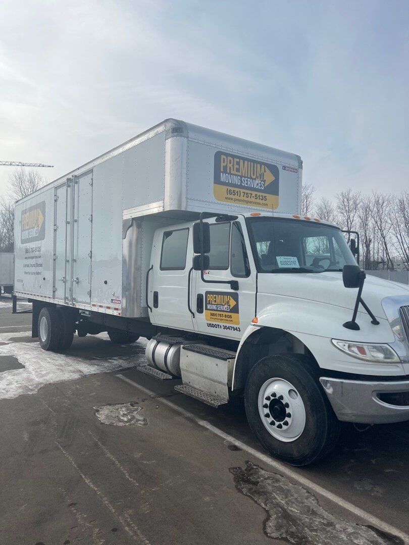 movers loading up moving truck for storage