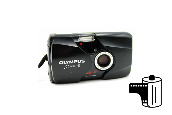 Black Olympus film camera with a roll of film icon.