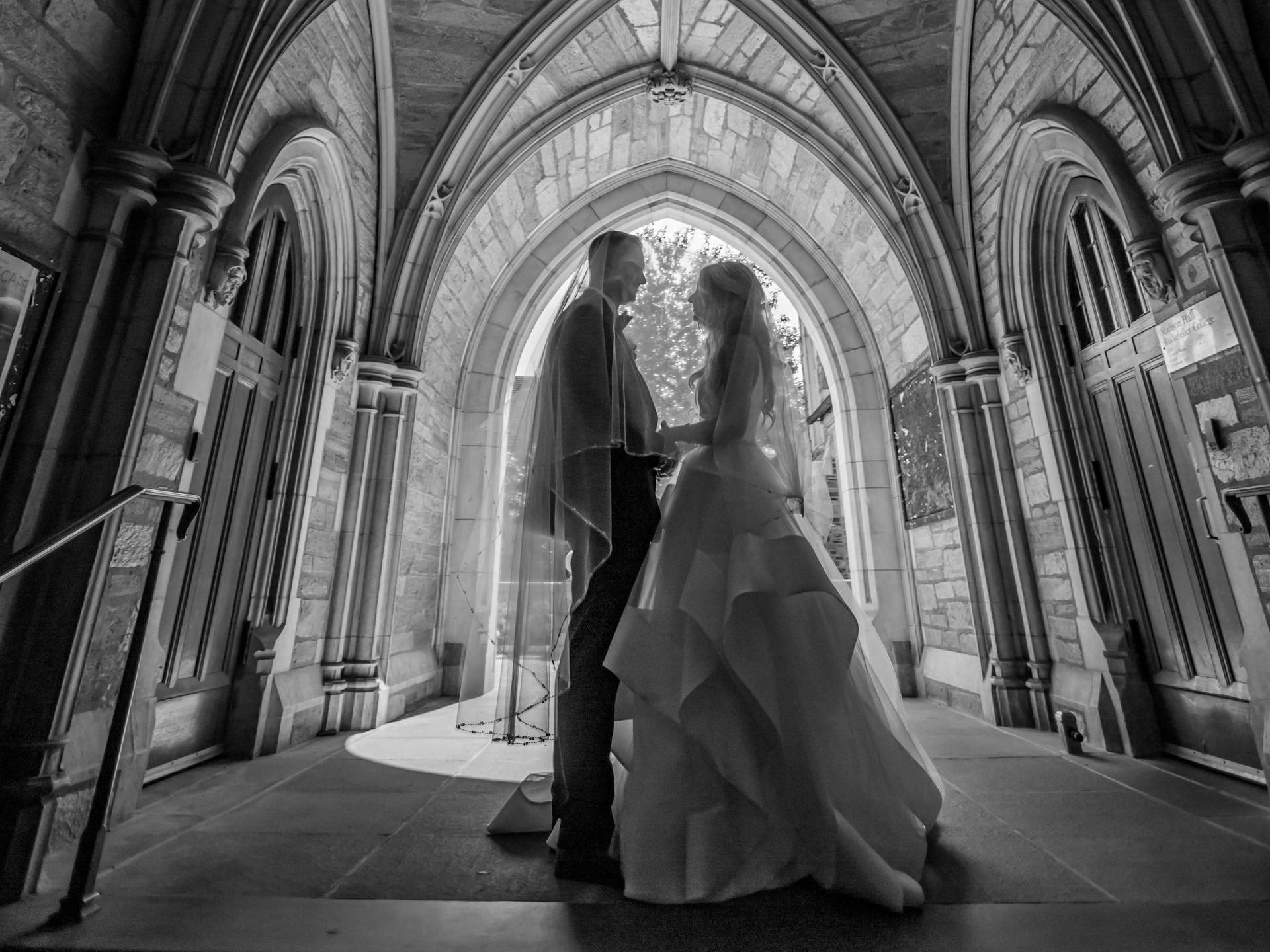 a person is holding a roll of film in their hand .