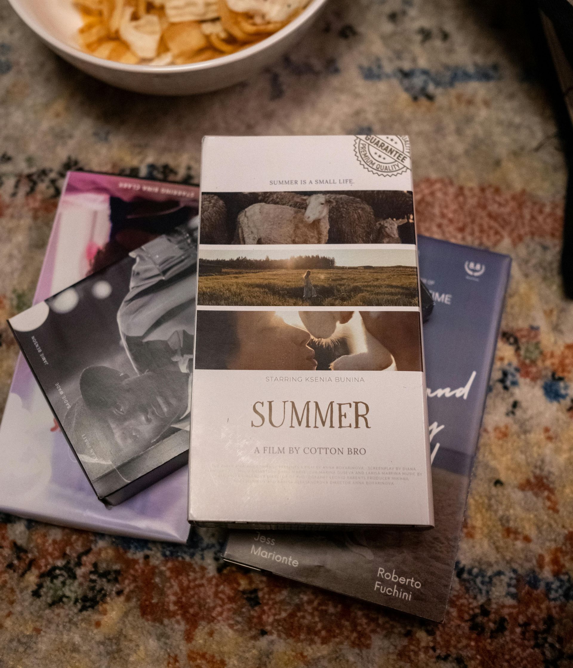 a person is holding a roll of film in their hand .