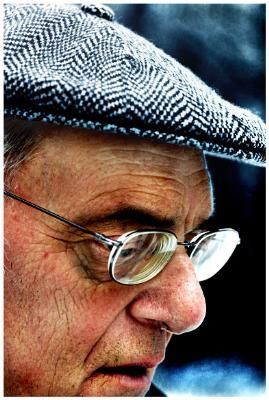 a person is holding a roll of film in their hand .