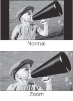 a person is holding a roll of film in their hand .