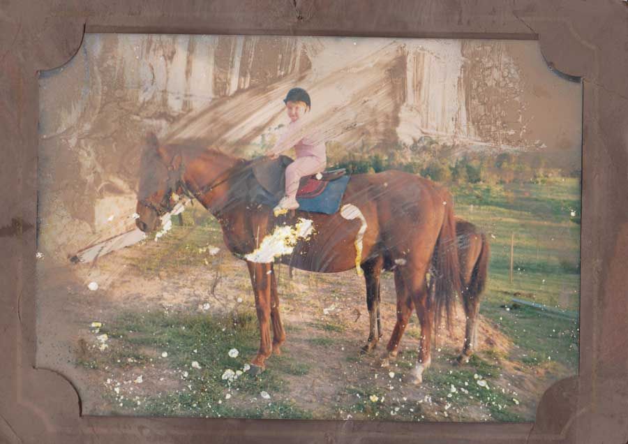 a person is holding a roll of film in their hand .