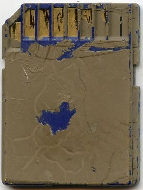 a person is holding a roll of film in their hand .