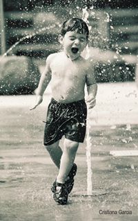 a person is holding a roll of film in their hand .