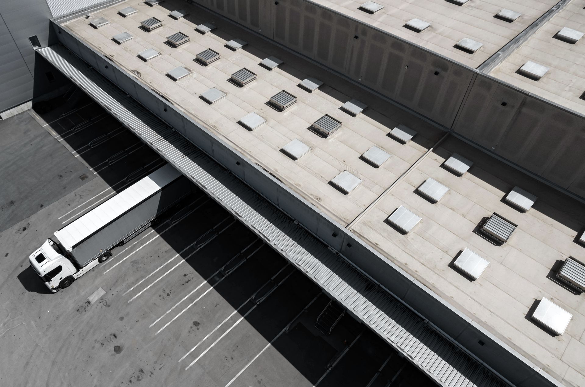 Aerial view of the roof of an industrial distribution center.
