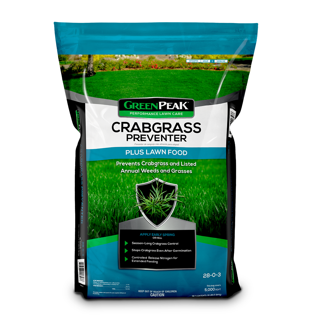 A black, white, and blue bag of green peak crabgrass preventer plus lawn food