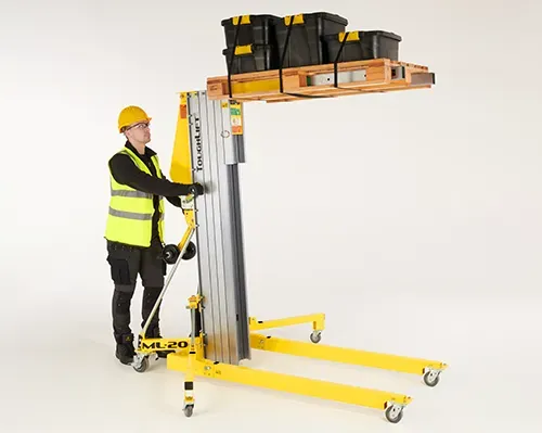 ToughLift Material Lifts Extension Forks accessory loaded with a pallet with boxes on top with carriage raised. 
