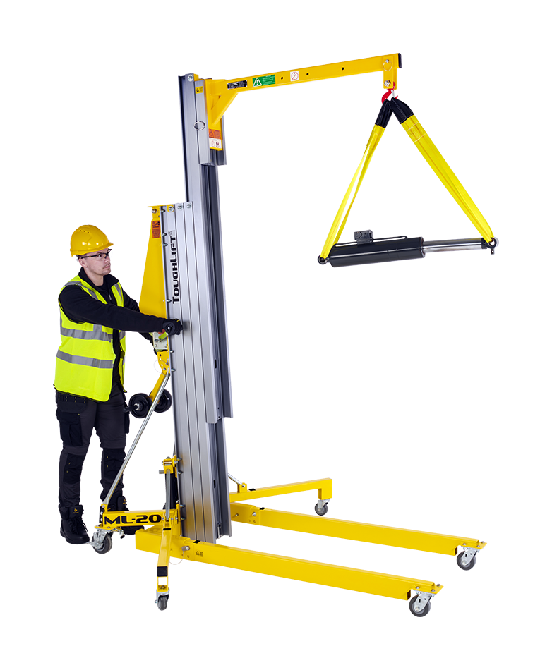ToughLift Material Lift lifting a hydraulic cylinder with the Boom attacment fitted to the machine.