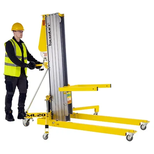 Operator pushing a ToughLift ML-20 material lift.