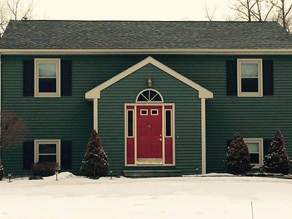 Beautiful House with Green Sidings - Siding Contractor in Essex Junction, VT