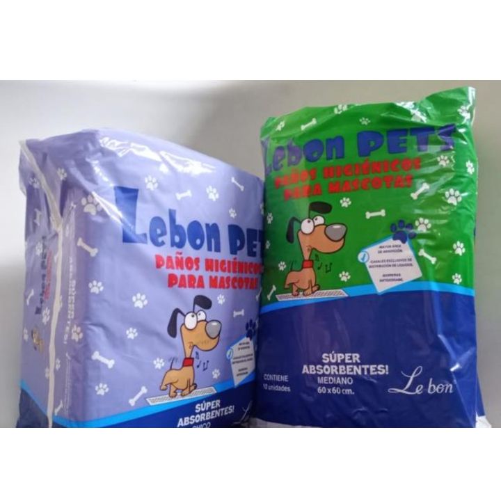 Dos bolsas de empapadores para perros, morados y verdes, con ilustraciones de perros de dibujos animados y texto.