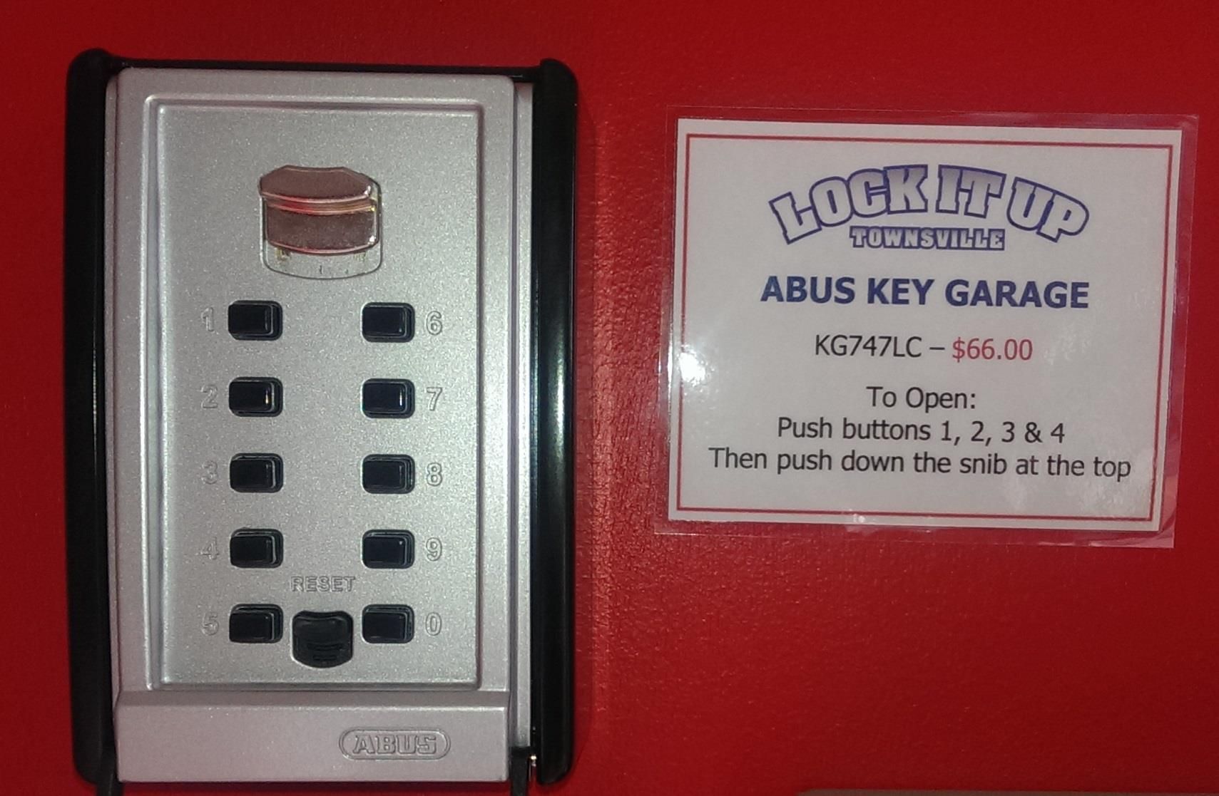 A Lock It Up Sign Next To A Key Safe — Lock It Up Townsville In Aitkenvale, QLD
