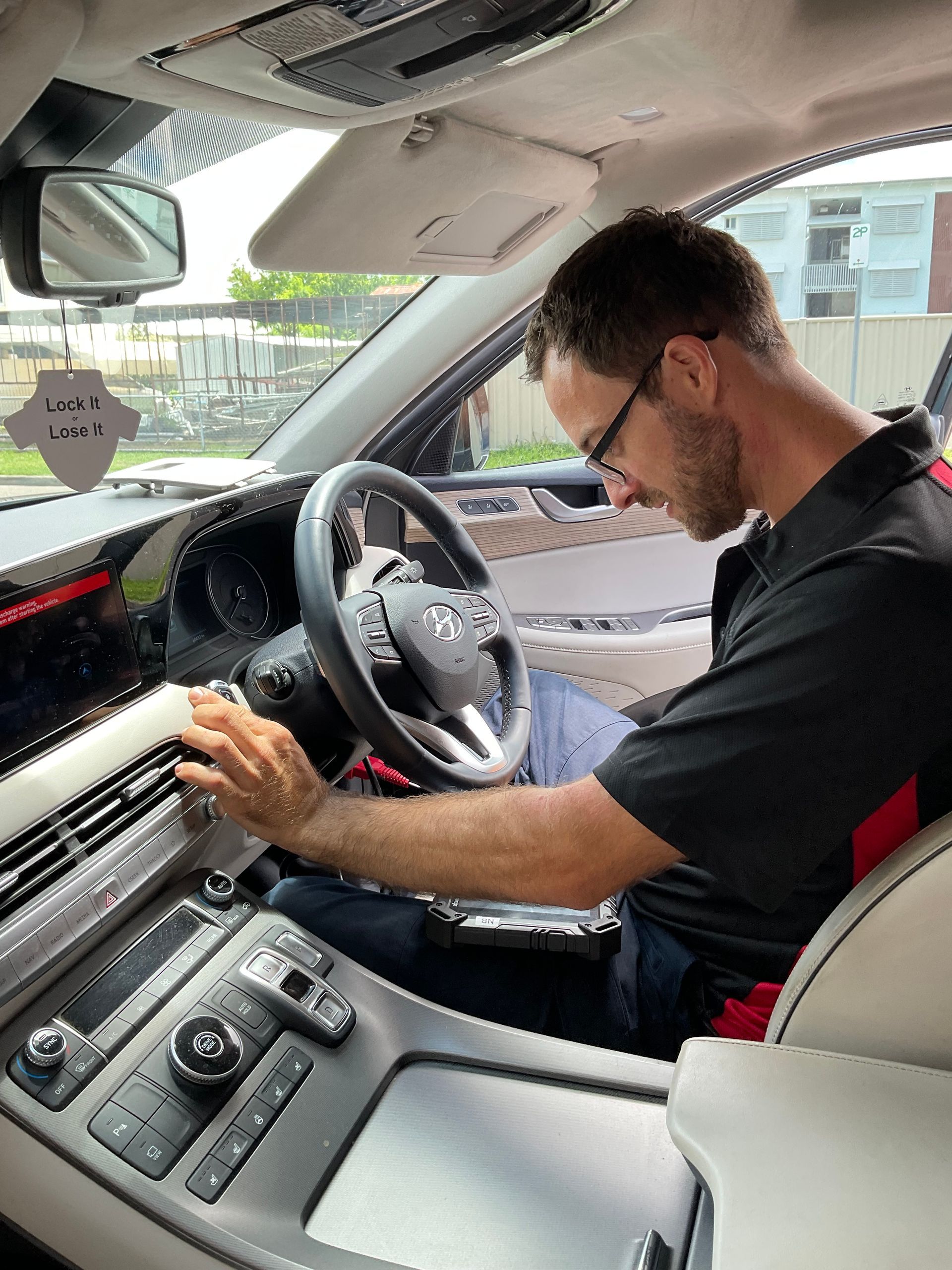 Five Different Colored Car Keys Are Lined Up In A Row — Lock It Up Townsville In Aitkenvale, QLD