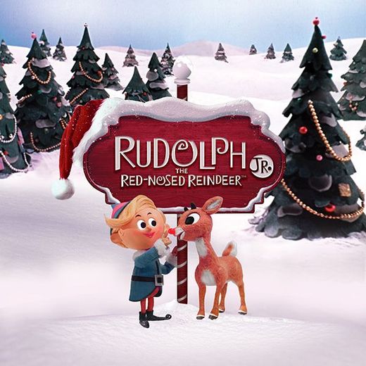 red sign that say Rudolph JR. In a inter scene with Christmas trees and snow with Hermie the Elf and Rudolph The Red-Nosed Reindeer.