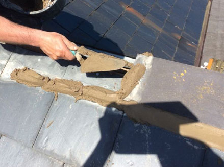 Roofer Installing Roof Guard - Roof Painting in Gold Coast, QLD