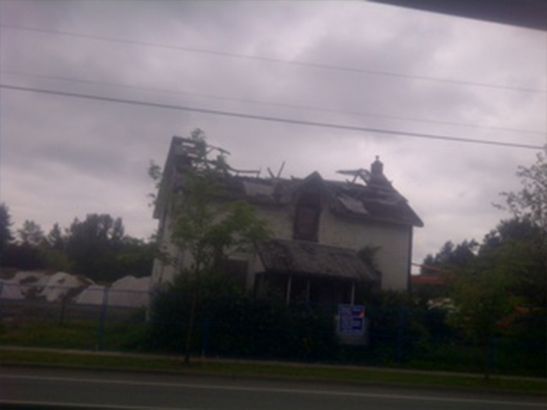 House With Broken Roof