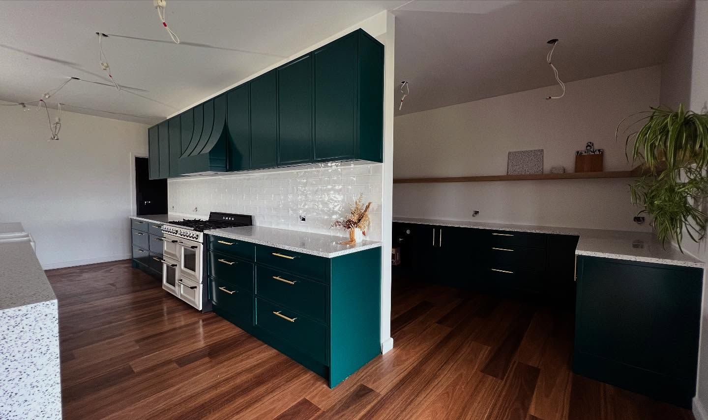 Modern Kitchen With Teal Cabinets — Onyx Detailed Joinery in Sutherland Shire, NSW