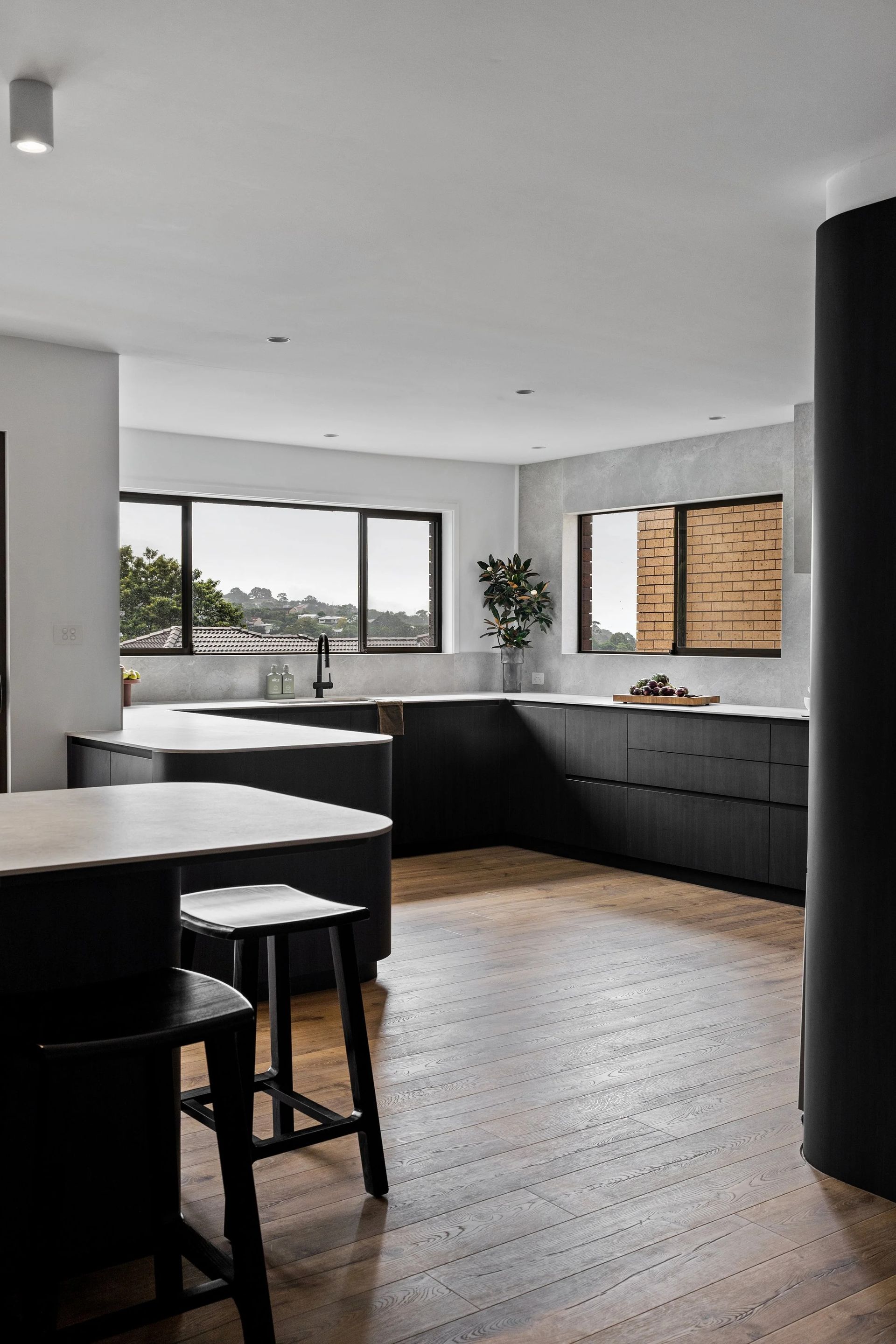 Modern Kitchen With Dark Cabinetry — Onyx Detailed Joinery in Unanderra, NSW