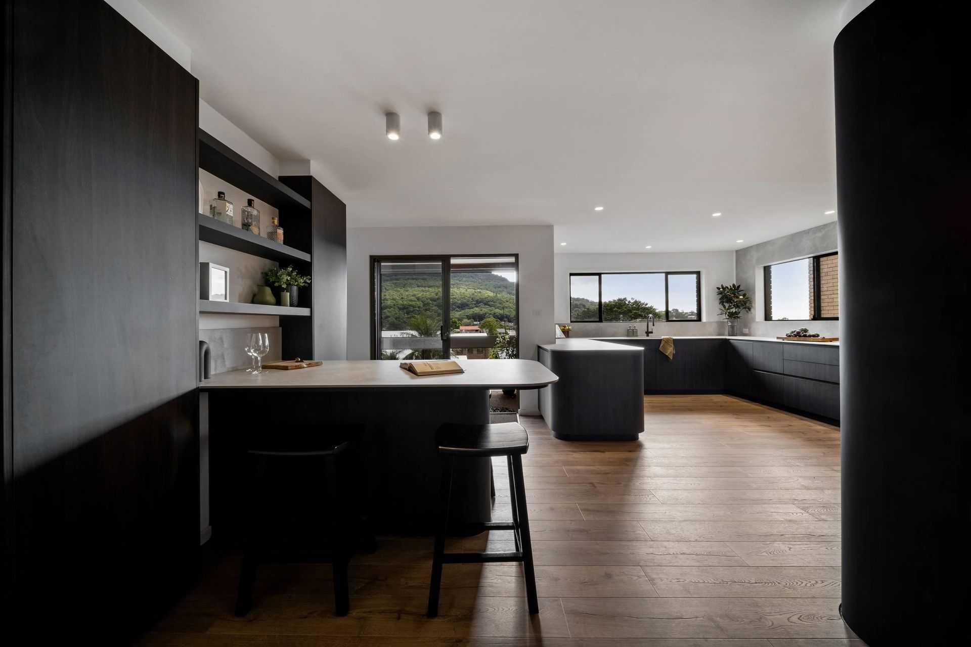 Modern Kitchen With Dark Cabinetry — Onyx Detailed Joinery in Unanderra, NSW