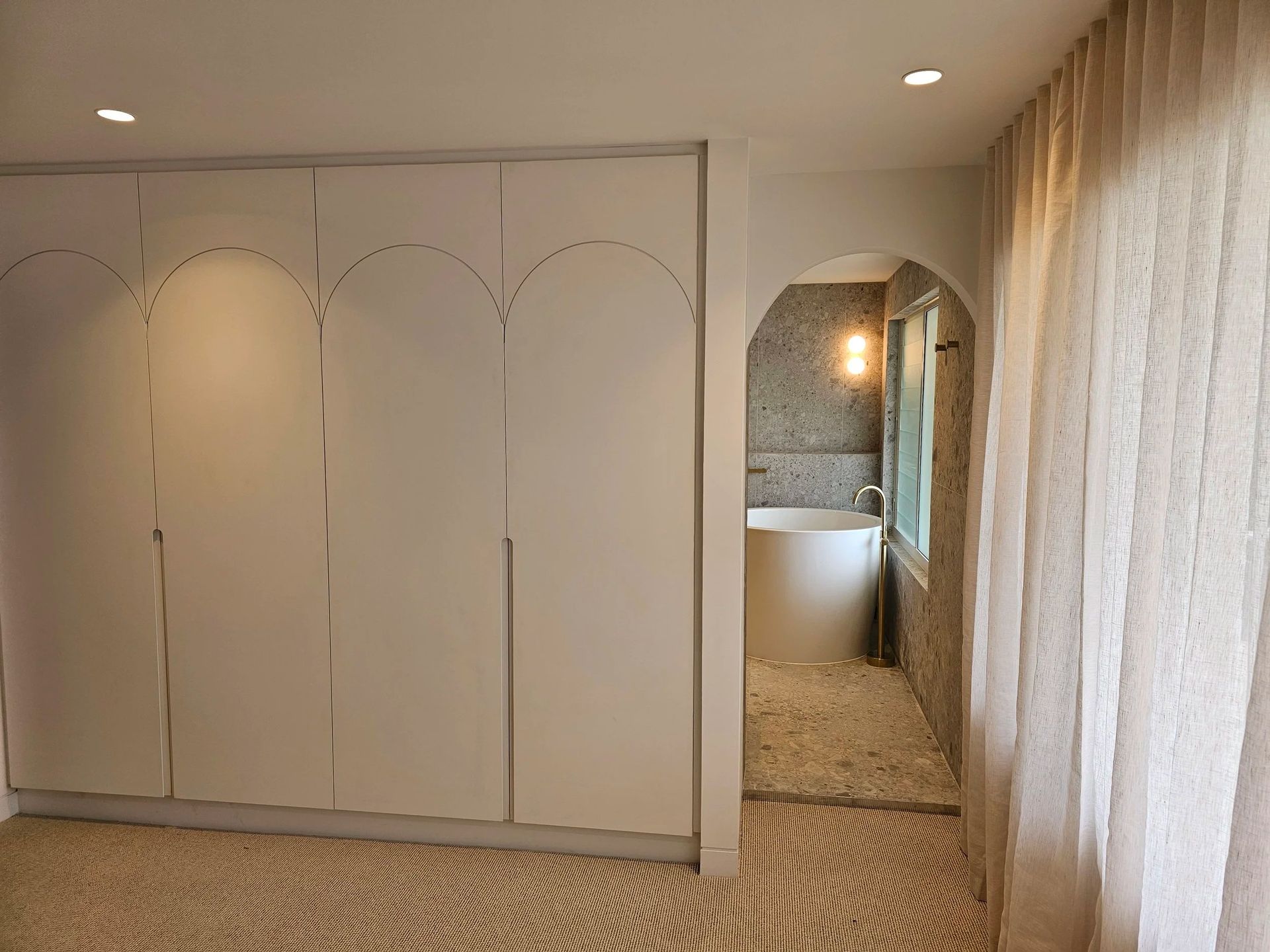 White Arched-door Closet — Onyx Detailed Joinery in Unanderra, NSW