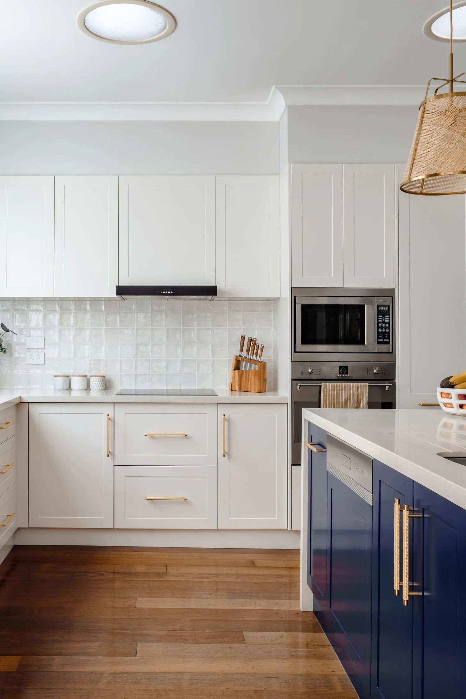 Modern Kitchen With White Cabinets — Onyx Detailed Joinery in Unanderra, NSW