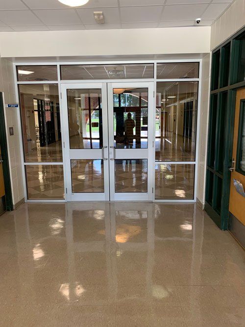 Newly Installed Stainless Frame and Glass Door — Dundee, IL — Baker Glass Works, Inc.