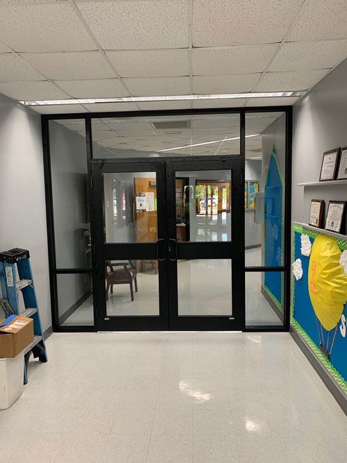 Newly Installed Black Frame and Glass Door — Dundee, IL — Baker Glass Works, Inc.