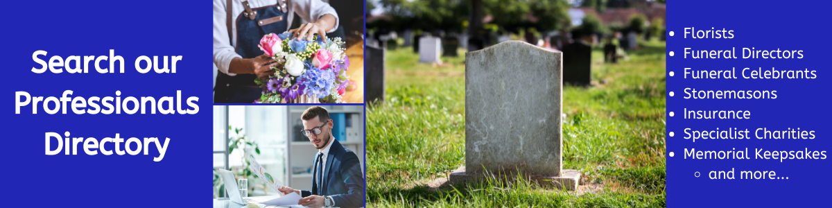 A man in a suit is sitting in front of a grave in a cemetery.