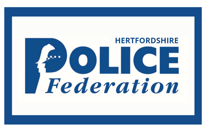 A blue and white logo for the hertfordshire police federation