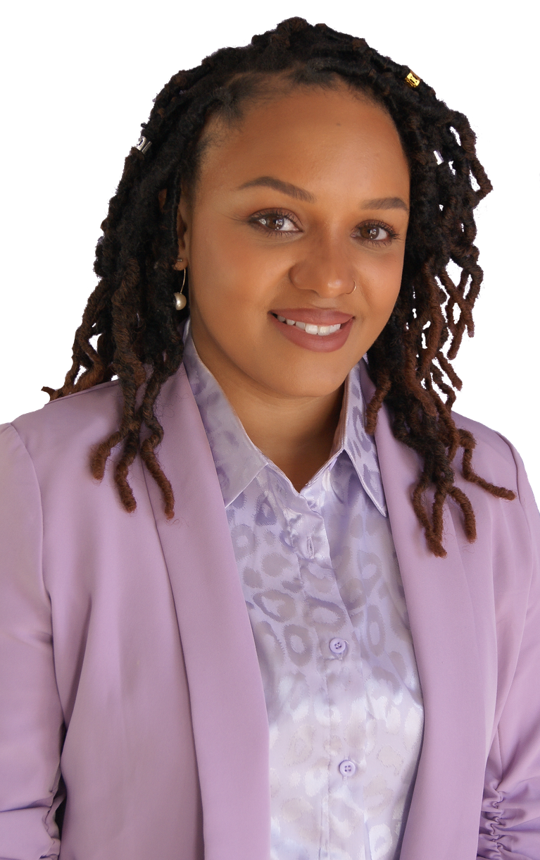 A woman with dreadlocks is wearing a white shirt and smiling