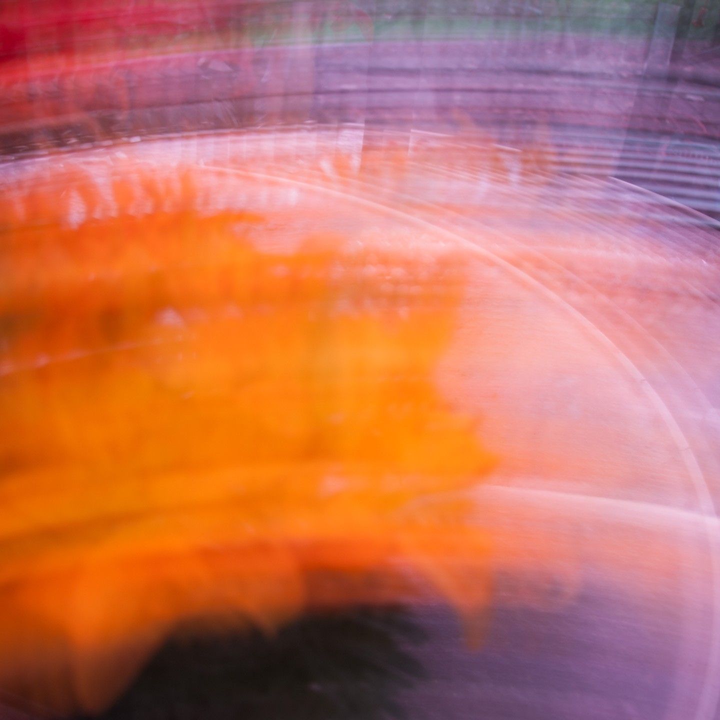 A blurry picture of a purple and orange background.