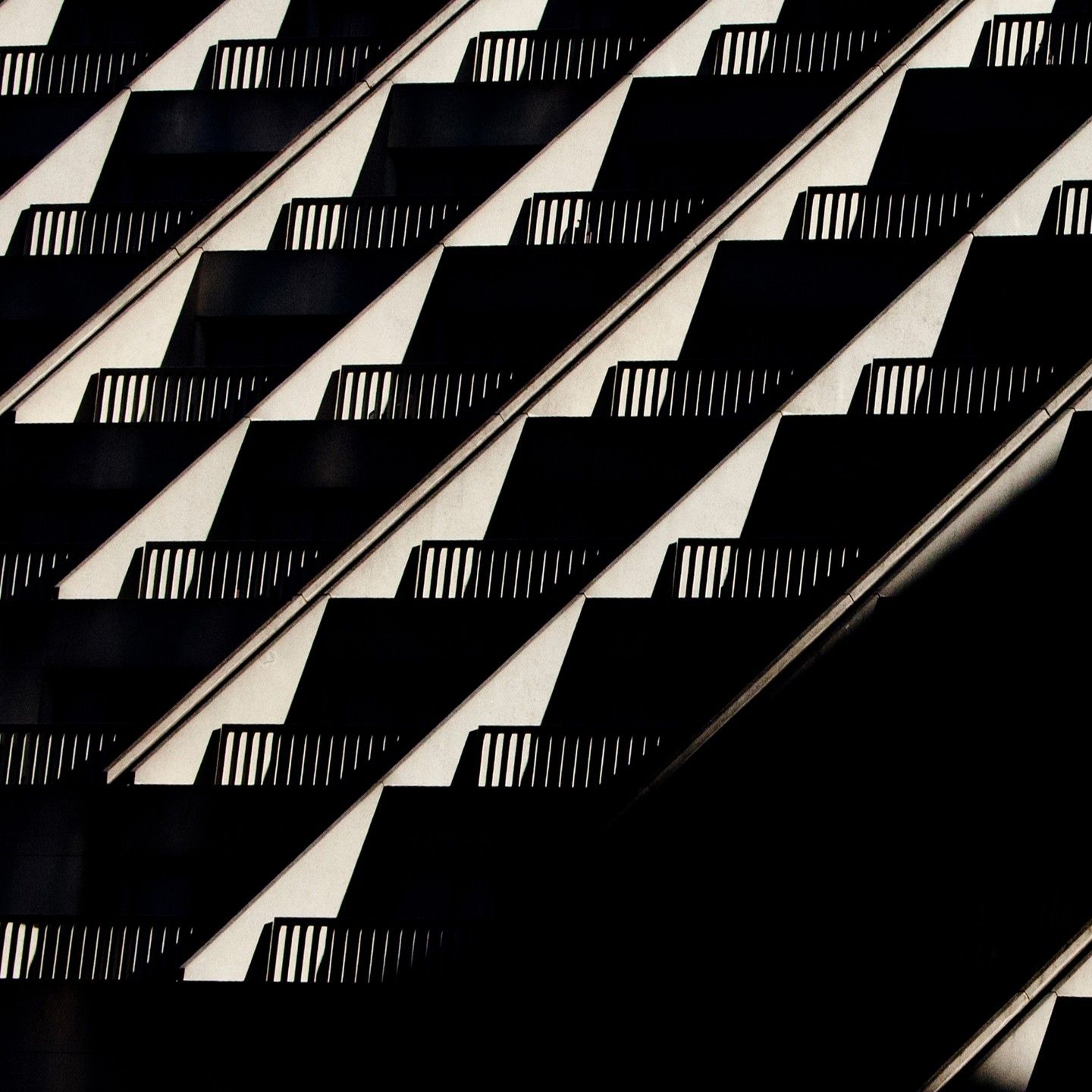 A black and white checkered pattern on a staircase