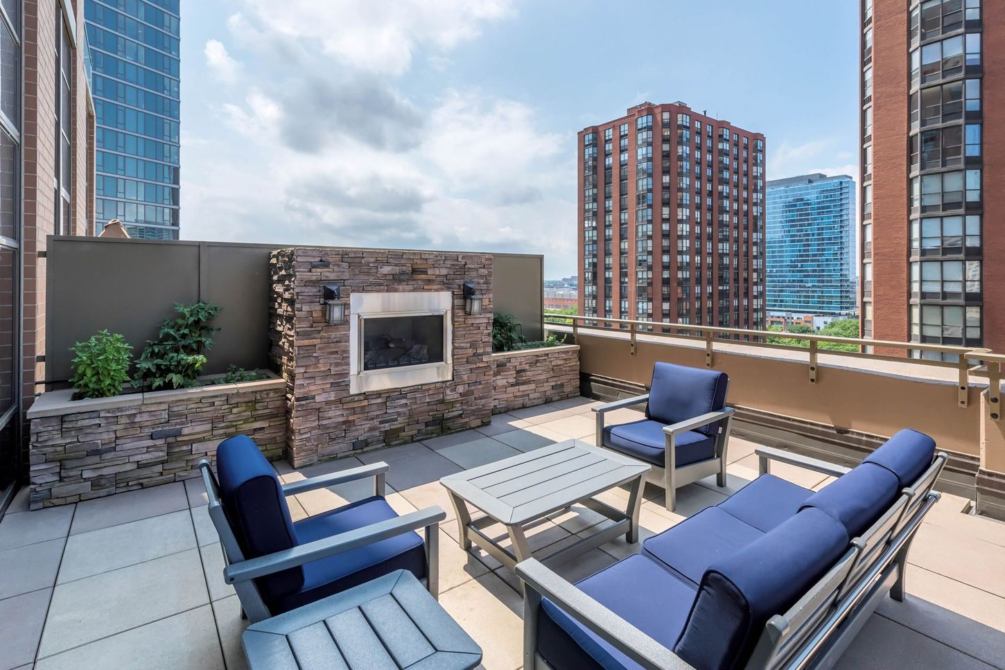 There is a fireplace on the roof of a building.