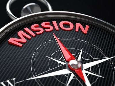 The word Mission on a compass