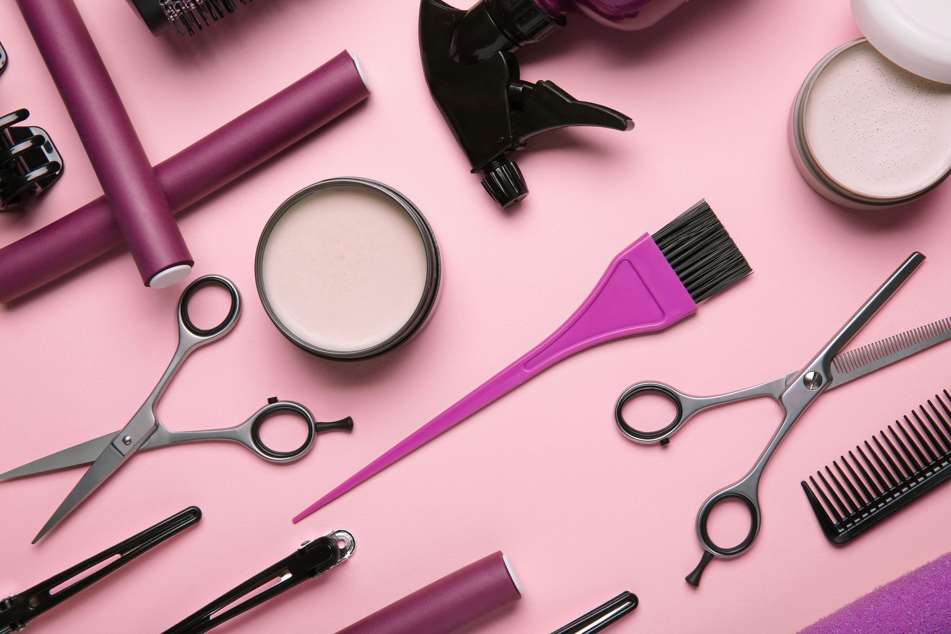 A close up of hair cutting and grooming tools.