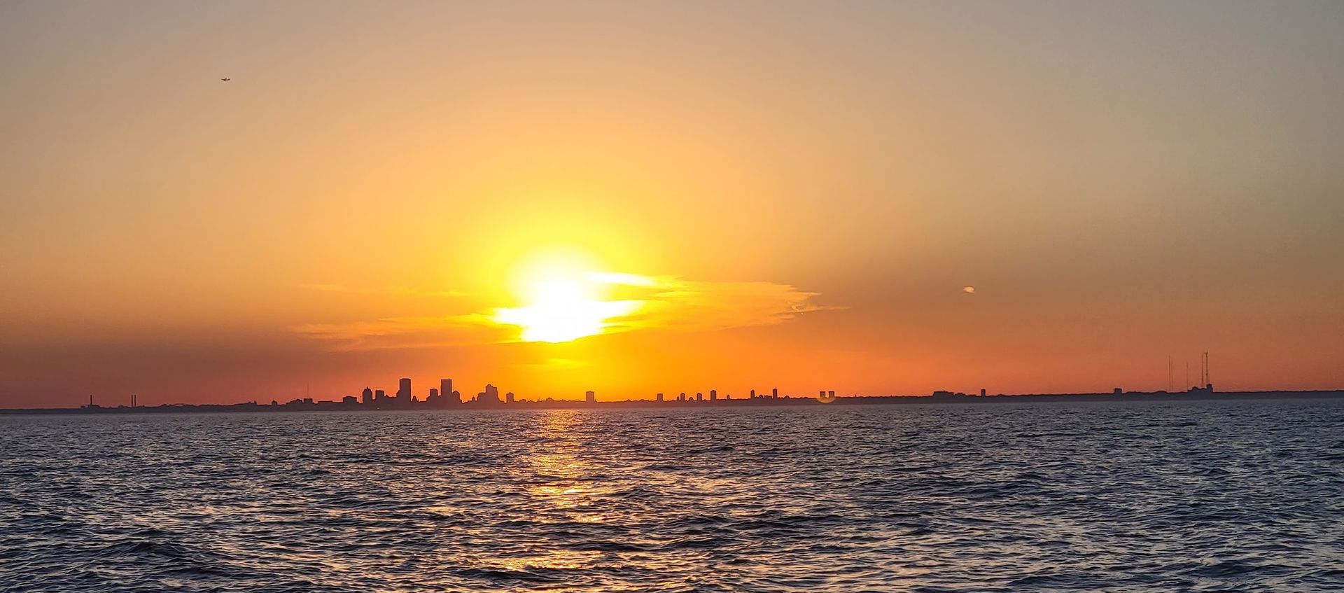 A beautiful sunset over Milwaukee from Lake Michigan is part of the experience.