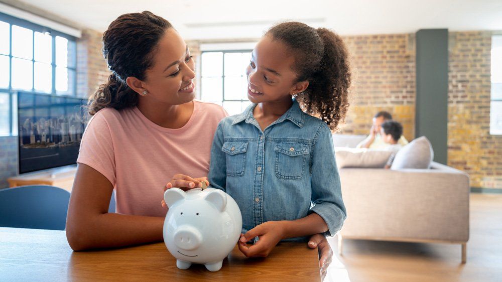 Mother And Daughter Saving Money — Sarasota, FL — Insurance Service of Sarasota, Inc.