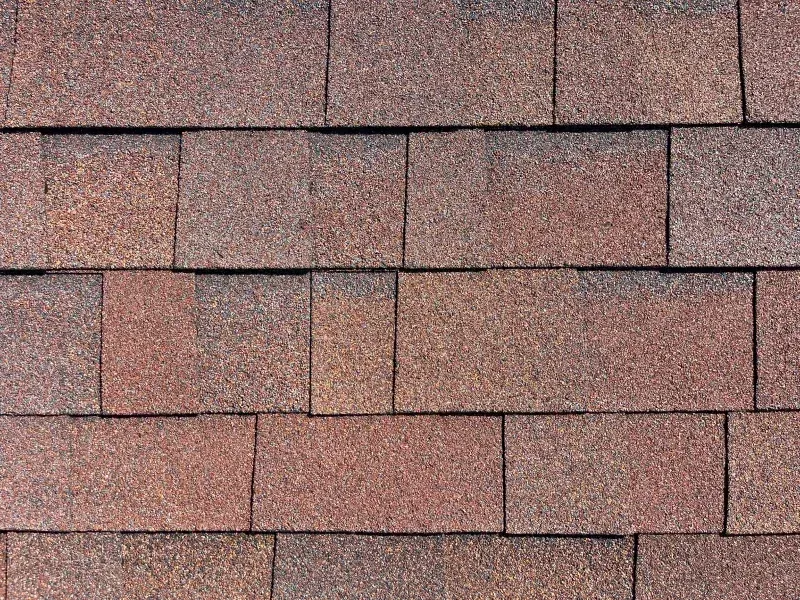 Brown asphalt roof shingles.