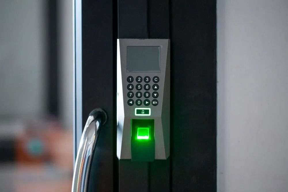 Fingerprint and Keypad Access Control System on a Black Door Frame — CTS Locksmiths in Maroochydore, QLD