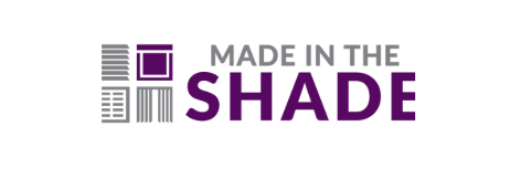 A purple and white logo for made in the shade