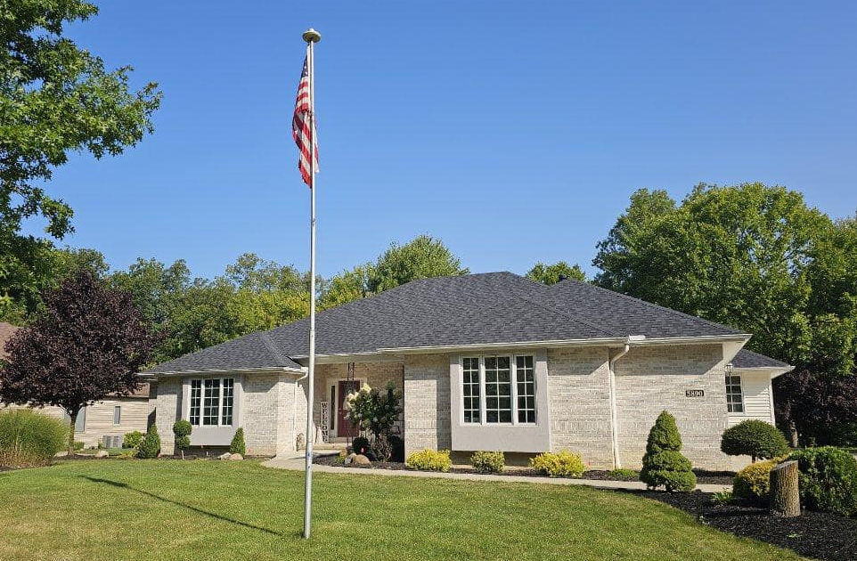 A house with a flag in front of it