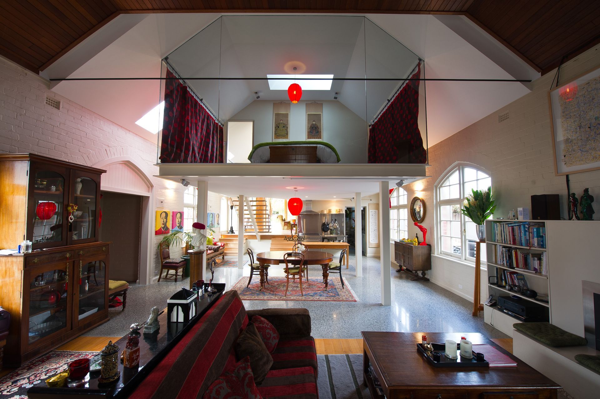 A living room with a couch and a table in it