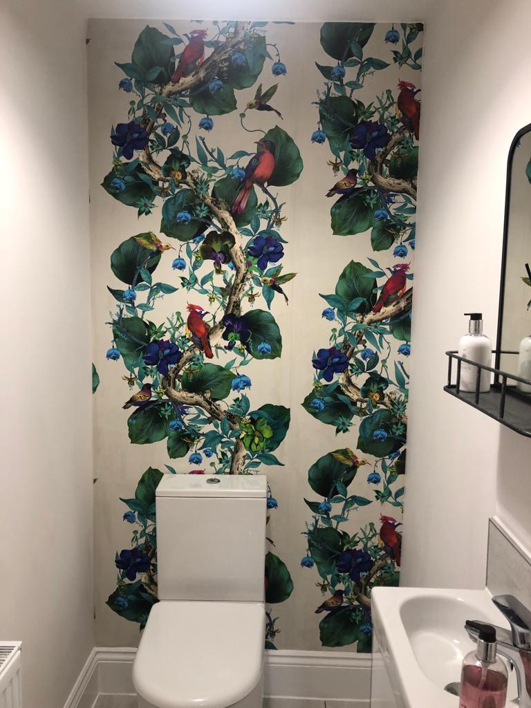 This is a picture of a wallpapered bathroom done by Painter and Decorators Leicester