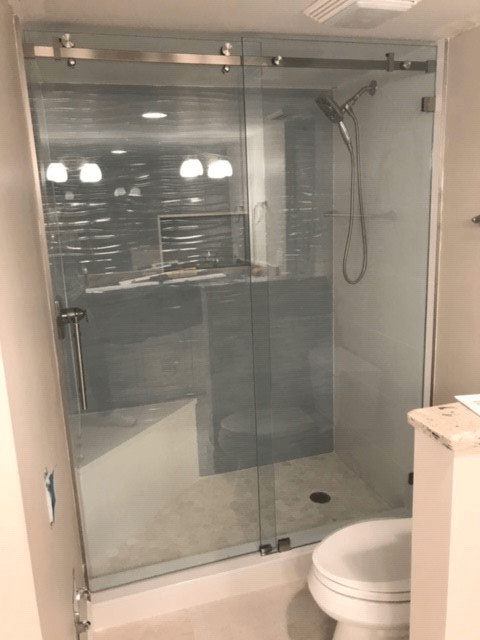 Bathroom With Sliding Glass Door — Naples, FL — Luxurious Glass LLC