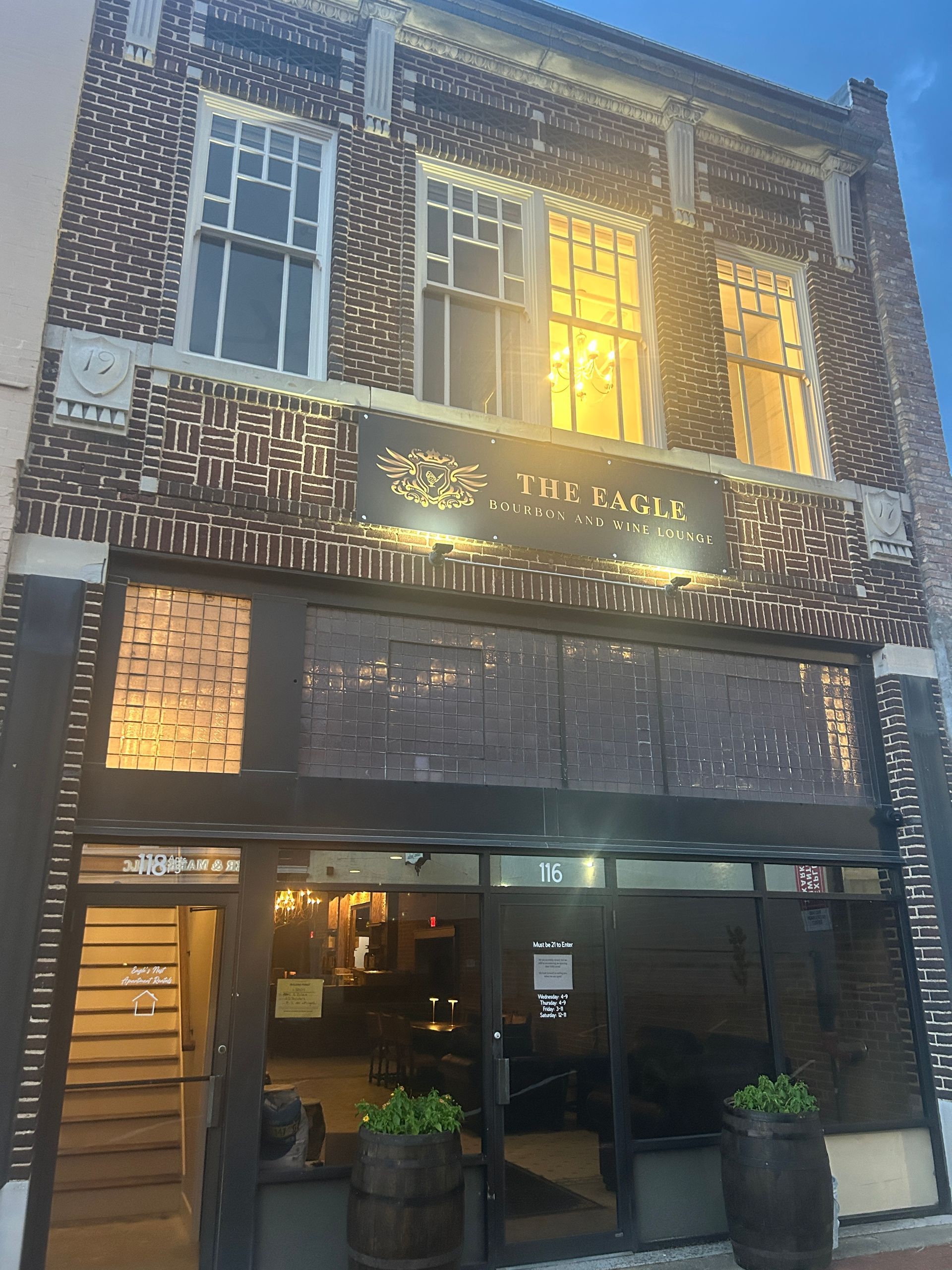 A street with a white line on the side of it at night.