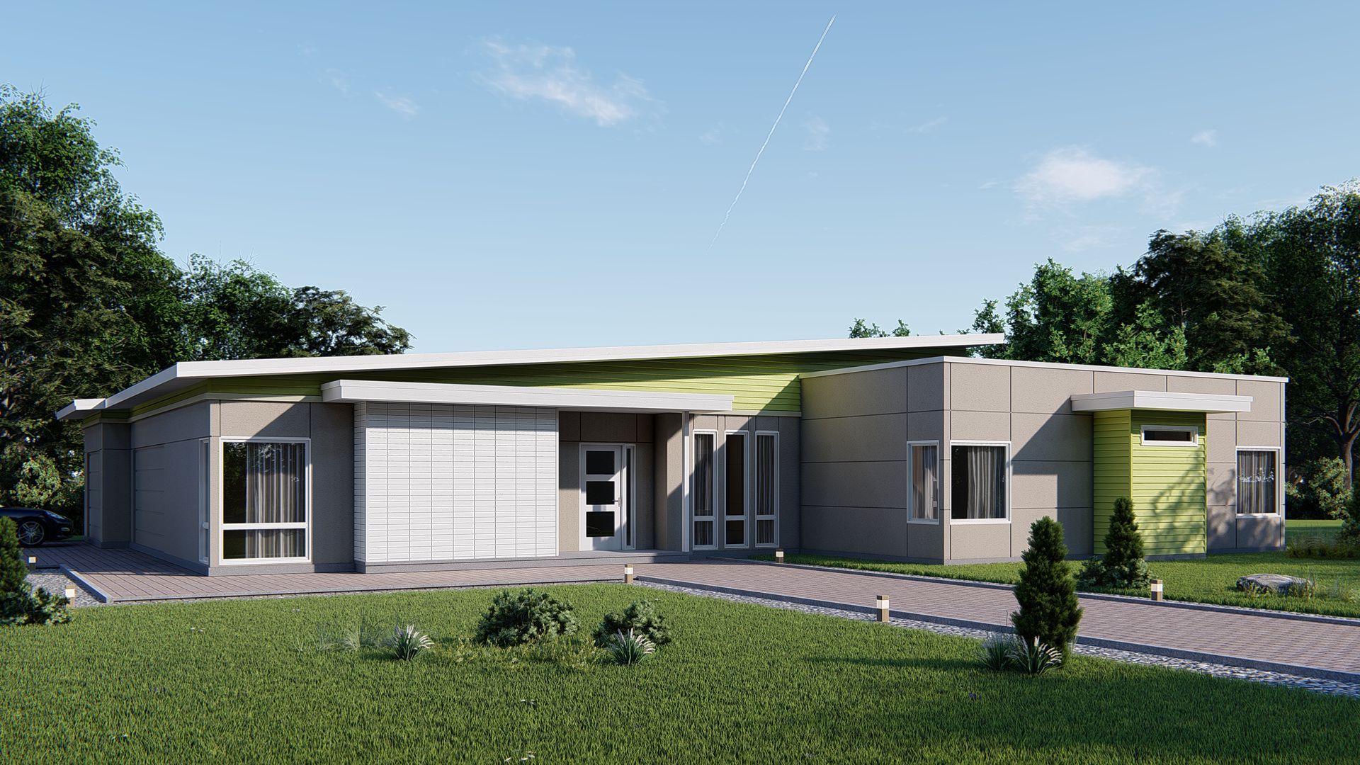 A modern house with a lot of windows is sitting on top of a lush green field.