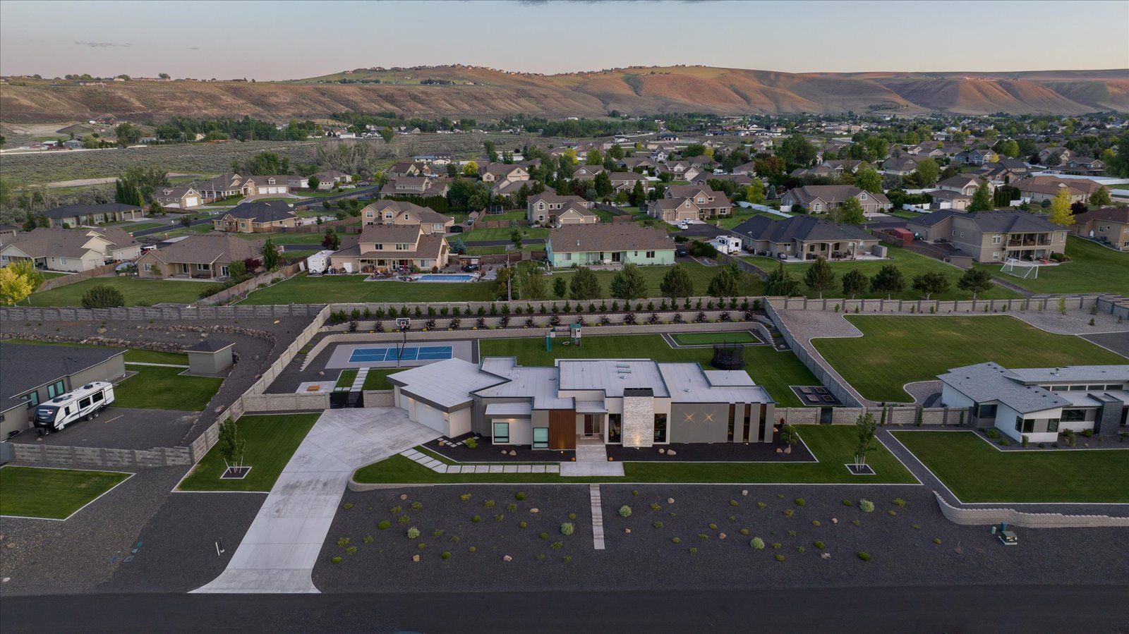 An aerial view of a house in a residential area