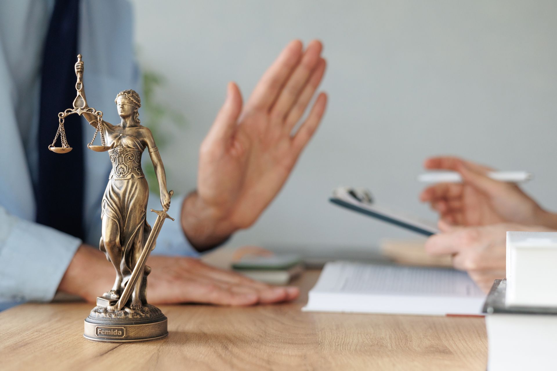 A female lawyer at a meeting with a male client in the office of the law office. A female lawyer at a meeting with a male client in the office of the law office.
